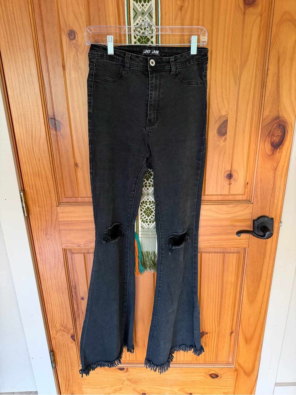 Distressed Black Flare Jeans with Frayed Hem